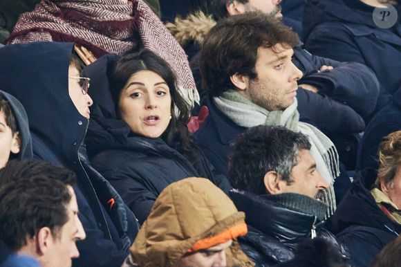 Agathe Lambret et son compagnon Benjamin Duhamel - Célébrités assistent au match de Ligue des champions entre le PSG et Manchester City (4-2) au Parc des Princes à Paris le 22 janvier 2025. © Cyril Moreau/Bestimage