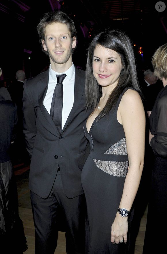 Romain Grosjean et sa femme Marion Jolles enceinte - Diner de Gala du 92eme Grand Prix d' Amerique au Grand Palais a Paris le 26 Janvier 2013. AGENCE / BESTIMAGE