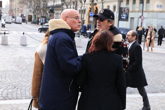 Bernard Laporte, Jean-Luc Reichmann arrivant à la cérémonie d'enterrement de Rolland Courbis à l'église de la Madeleine à Paris, France, le 14 janvier 2026. Rolland Courbis, ancien footballeur français, entraîneur et commentateur médiatique au franc-parler, est décédé à l'âge de 72 ans. Photo par Jerome Domine/ABACAPRESS.COM