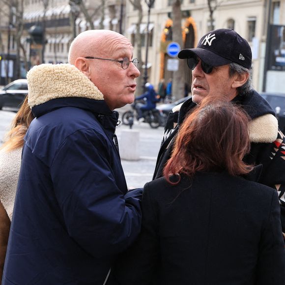 Bernard Laporte, Jean-Luc Reichmann arrivant à la cérémonie d'enterrement de Rolland Courbis à l'église de la Madeleine à Paris, France, le 14 janvier 2026. Rolland Courbis, ancien footballeur français, entraîneur et commentateur médiatique au franc-parler, est décédé à l'âge de 72 ans. Photo par Jerome Domine/ABACAPRESS.COM
