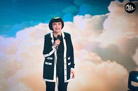 À 80 ans, elle se dit "heureuse d’être à Berlin" pour cette deuxième date de sa tournée d’adieux.

Mireille Mathieu - Enregistrement de l'émission "Vivement dimanche" aux studios Rive Gauche, présentée par M.Drucker et diffusée le 5 octobre 2025 sur France. No web pour la Belegique et la Suisse # | 00723696
