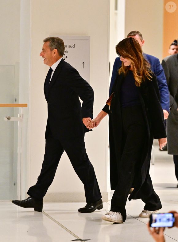 Nicolas Sarkozy et sa femme Carla Bruni au Tribunal judiciaire (Batignolles, 32ème chambre correctionnelle) pour l'annonce de la décision dans le cadre du procès Lybien le 25 septembre 2025.

© Christian Liewig / Bestimage