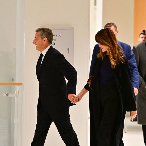 Nicolas Sarkozy et sa femme Carla Bruni au Tribunal judiciaire (Batignolles, 32ème chambre correctionnelle) pour l'annonce de la décision dans le cadre du procès Lybien le 25 septembre 2025.

© Christian Liewig / Bestimage