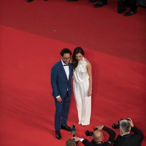 Thomas Hollande, sa femme Emilie Broussouloux - Montée des marches du film "R.M.N." lors du 75ème Festival International du Film de Cannes, le 21 mai 2022.
© Pool/ Bestimage