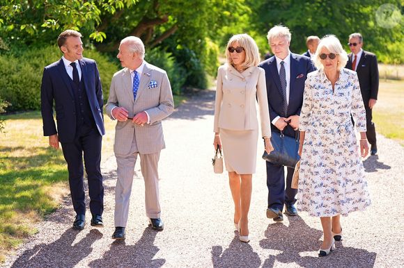Déambulation d'Emmanuel Macron, président de la République Française, et de la Première dame Brigitte Macron, dans les jardins du château de Windsor avec le roi Charles III d'Angleterre et Camilla Parker Bowles, reine consort, le 9 juillet 2025. Au cours de cette promenade, le chef de l'Etat français et le souverain britannique ont abordé la protection de la biodiversité. Le couple présidentiel français est en visite officielle en Grande-Bretagne du 8 au 10 juillet 2025.