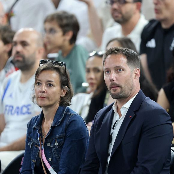 Thomas Pesquet et sa compagne Anne Mottet - Les célébrités en tribunes pendant l'épreuve de basketball de Demi-Finale opposant la France à l'Allemagne lors des Jeux Olympiques de Paris 2024 (JO) à l'Arena Bercy, à Paris, France, le 8 août 2024. © Jacovides-Perusseau/Bestimage