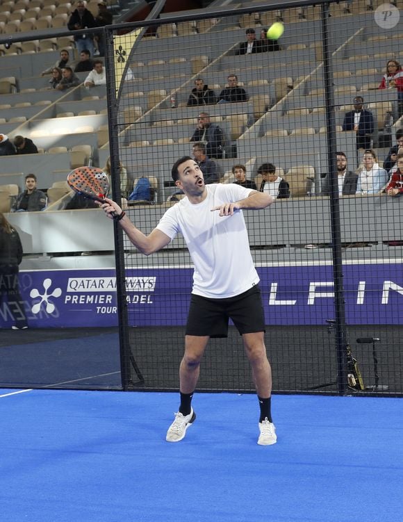 Exclusif - Adil Rami - Célébrités participent au tournoi "Padel Invitational” co-organisée par Webedia et la Fédération Française de Tennis (FFT) sur le court Philippe Chatrier lors du Greenweez Paris Major Premier Padel 2024 à Roland Garros le 28 septembre 2024. © Marc Ausset-Lacroix/Bestimage