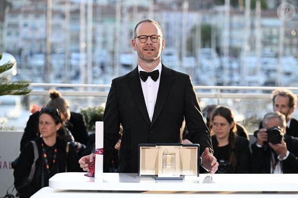 Le réalisateur et scénariste norvégien Joachim Trier pose lors d'un photocall après avoir remporté le Grand Prix pour le film "Affeksjonsverdi" (Valeur sentimentale) lors de la cérémonie de clôture de la 78e édition du Festival de Cannes à Cannes, France, le 24 mai 2025. Photo de David Niviere/ABACAPRESS.COM