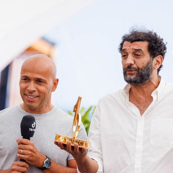 Éric Judor et Ramzy Bedia assistent à la cérémonie des lauréats du concours international de courts métrages TikTok #TikTokShortFilm qui se tient à La plage de la palme le 23 mai 2023 à Cannes, France. Photo by David Boyer/ABACAPRESS.COM