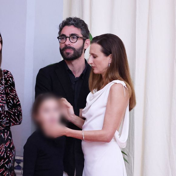 Camille Cottin accompagnée de son compagnon Benjamin Mahon et de leur fille Anna Paloma au photocall de cérémonie de clôture du 20ème Festival International du Film de Marrakech, au Maroc, le 2 décembre 2023. 

DOMINIQUE JACOVIDES / BESTIMAGE