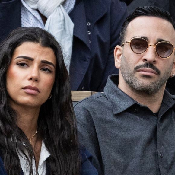 Adil Rami catégorique sur le mariage

Adil Rami et sa compagne en tribunes lors des Internationaux de France de Tennis de Roland Garros, à Paris, France. © Cyril Moreau/Bestimage
