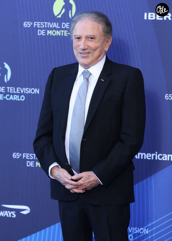 Michel Drucker - Photocall de la cérémonie d'ouverture de la 65ème édition du Festival TV De Monte Carlo le 12 Juin 2026
 © Denis Guignebourg /Bestimage
