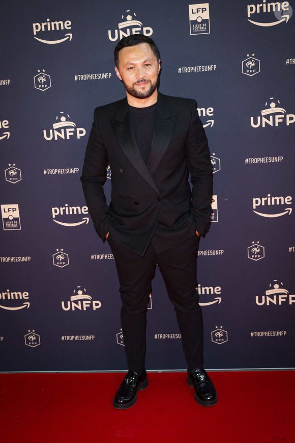 Karim Bennani au photocall de la 31ème cérémonie des "Trophées UNFP" au Pavillon Gabriel. Paris, le 28 mai 2023.