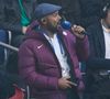 Après avoir conquis le monde avec sa voix, le voici dans un tout nouveau rôle. 

Jean-Luc Guizonne en tribunes du match de Ligue 1 McDonald's opposant le Paris Saint-Germain (PSG) au Racing Club de Lens (RCL) (1-0) au Parc des Princes à Paris, France, le 2 novembre 2024. Cyril Moreau/Bestimage