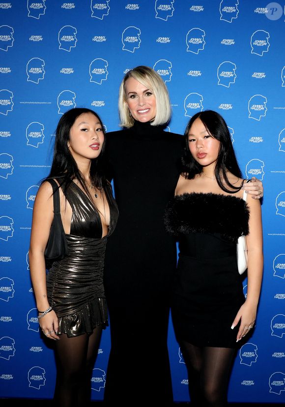 Exclusif - Laeticia Hallyday et ses filles Jade et Joy - Soirée d'ouverture de l'exposition Johnny Hallyday à Bruxelles Expo le 19 décembre 2022. © Dominique Jacovides / Bestimage