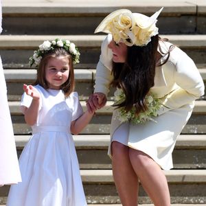 La duchesse de Cambridge Catherine (à droite) et sa fille la princesse Charlotte (à gauche) quittent la chapelle St George du château de Windsor après la cérémonie du mariage royal du prince Harry, duc de Sussex, et de Meghan, duchesse de Sussex, à Windsor, en Grande-Bretagne, le 19 mai 2018. Le couple s'est vu conférer les titres royaux de duc et duchesse de Sussex par le monarque britannique. Photo by Neil Hall / ABACAPRESS.COM