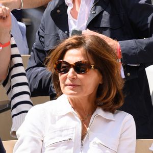 En effet, elle est en charge de la coordination des équipes de reportage, en particulier pour le JT de 13 heures, sur les thèmes de la gastronomie, de l’artisanat, de la musique et du spectacle. 

Gilles Bouleau et son épouse Elisabeth Tran-Bouleau dans les tribunes lors des Internationaux de France de tennis à Roland Garros le 28 mai 2022 à Paris, France. Photo by Laurent Zabulon/ABACAPRESS.COM