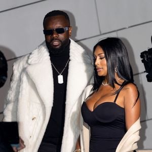 Gims et sa nouvelle compagne - Les célébrités au défilé Louis Vuitton "Collection Homme Prêt-à-Porter Automne/Hiver 2026-2027" lors de la Fashion Week de Paris, le 20 janvier 2026

© Florian Lavielle / Bestimage