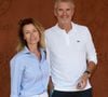 Denis Brogniart et sa femme Hortense filent le parfait amour depuis plus de vingt ans.

Denis Brogniart et sa femme Hortense au village lors des Internationaux de France de tennis de Roland Garros, à Paris, France. © Jacovides-Moreau/Bestimage