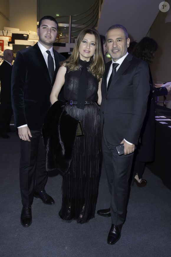 Elie Saab Jr. , Elie Saab et sa femme Claudine - Dîner organisé par Babeth Djian au profit de l’association AEM (un Avenir pour les Enfants du Monde) au bénéfice des enfants du Rwanda à l’Espace Pierre Cardin à Paris le 16 décembre 2015. © Olivier Borde / Bestimage