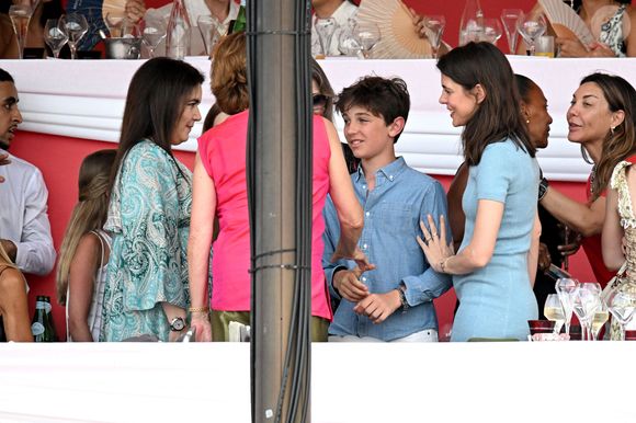 La princesse Caroline de Hanovre, sa fille Charlotte Casiraghi, son fils, né de son union avec Gad Elmaleh, Raphael, Melanie de Massy et Diane Fissore, la présidente du jumping et de la Fédération monégasque d’équitation, ont assisté à la 2eme journée du Jumping International de Monte-Carlo, le 4 juillet 2024. La compétition se déroule sur le port Hercule à Monaco, du 3 juillet au 5 juillet.© Bruno Bebert/Bestimage