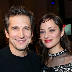 Guillaume Canet et sa compagne Marion Cotillard (en Chanel) - Intérieur du dîner Chanel des révélations César au Petit Palais à Paris.
© Olivier Borde/Bestimage