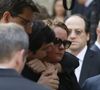 Cendrine Dominguez avec son fils Léo - Sorties des obsèques de Patrice Dominguez en la basilique Sainte Clotilde à Paris. Le 16 avril 2015
© Jacovides - Clovis / Bestimage