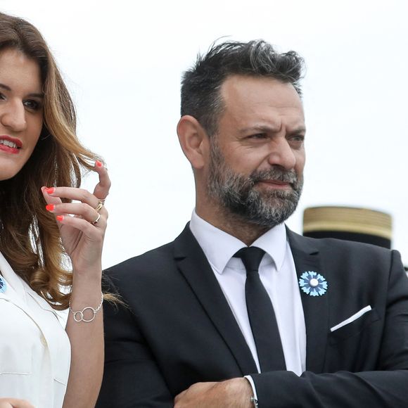 Marlène Schiappa Secrétaire d'Etat auprès de la Première ministre, chargée de l'Economie sociale et solidaire et de la Vie associative et sonn compagnon lors de la cérémonie du 143ème défilé militaire du 14 juillet, jour de la Fête Nationale, sur les Champs-Elysées et la place de la Concorde, à Paris, France, le 14 juillet 2023. © Stéphane Lemouton/Bestimage