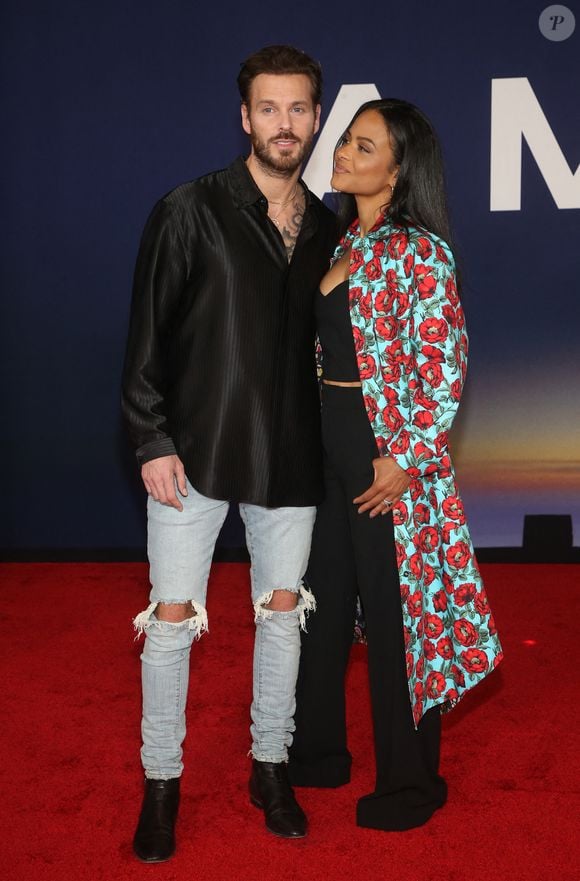 Matt Pokora et sa femme Christina Milian au photocall lors de la première du film "Ambulance" à Los Angeles le 4 avril 2022. Broadimage / Bestimage
