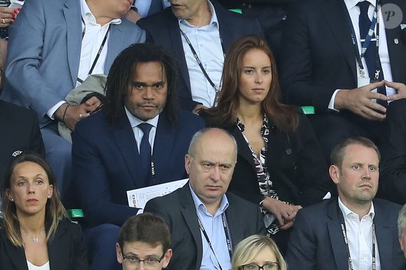 Christian Karembeu et sa compagne Jackie Chamoun au match Angleterre-Slovaquie à Saint-Étienne le 20 juin 2016.

© Cyril Moreau / Bestimage
