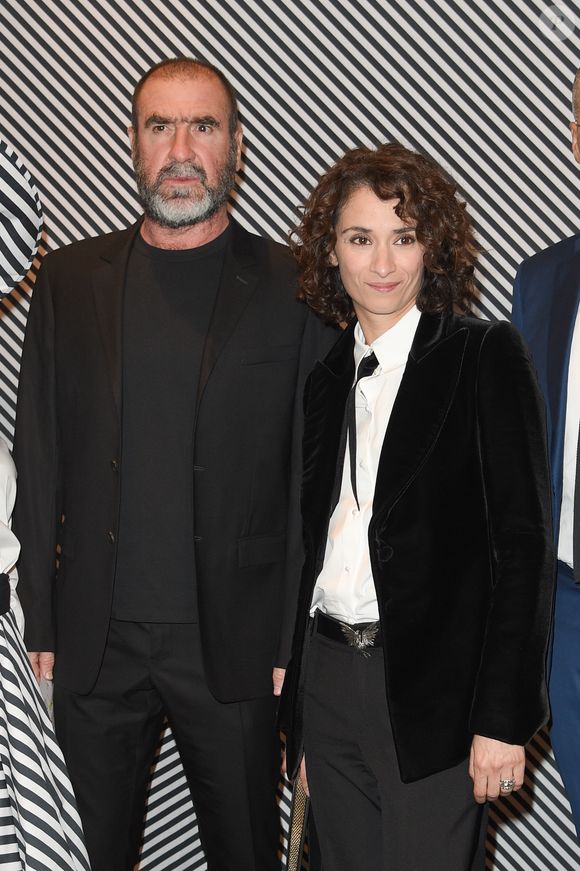 "Il y a des morceaux chantés par ma femme ou par moi et nous en interpréterons aussi certains ensemble", a-t-il expliqué aux journalistes.

Eric Cantona et Rachida Brakni au dîner de gala annuel de la société des amis du Centre Pompidou, le 10 avril 2018. 

Photo : Coadic Guirec / Bestimage