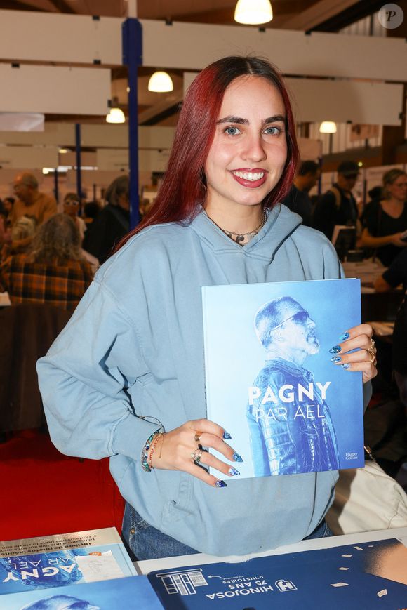 La jeune photographe a choisi de ne pas céder à la peur ni aux scénarios négatifs.

Ael Pagny, à la Halle Georges Brassens de Brive-la-Gaillarde pour la Foire du Livre de Brive , le 9 novembre 2024. © Jean-Marc Lhomer / Bestimage