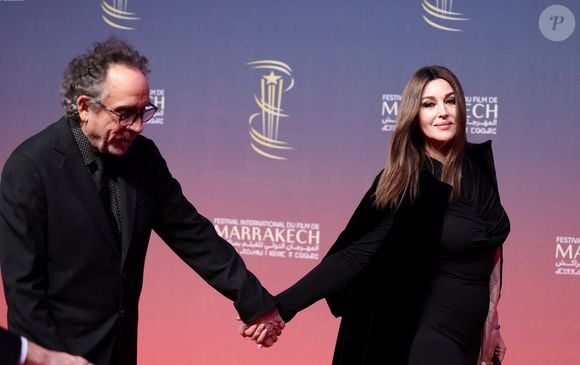 Tim Burton et Monica Bellucci au photocall de la cérémonie d'ouverture et à la projection du film "L'Ordre" lors du 21ème Festival international du film de Marrakech, le 29 novembre 2024j à Marrakech, Maroc. © Dominique Jacovides/Bestimage
