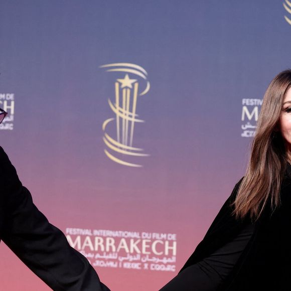 Tim Burton et Monica Bellucci au photocall de la cérémonie d'ouverture et à la projection du film "L'Ordre" lors du 21ème Festival international du film de Marrakech, le 29 novembre 2024j à Marrakech, Maroc. © Dominique Jacovides/Bestimage