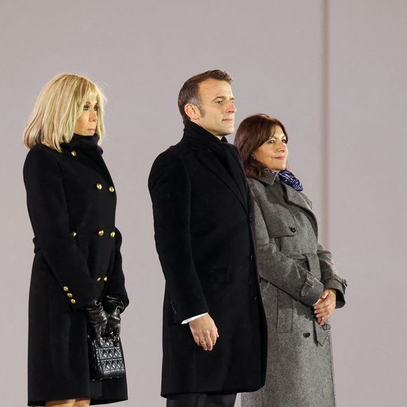 Brigitte Macron, le président de la République française Emmanuel Macron, Anne Hidalgo, maire de Paris - Arrivées à la cérémonie de réouverture de la cathédrale Notre-Dame de Paris, le 7 décembre 2024. Joyau de l’art gothique, lieu de culte et de culture, symbole universel de la France et de son histoire, la cathédrale de Notre-Dame de Paris rouvre ses portes les 7 et 8 décembre, cinq ans après le terrible incendie qui l’avait ravagée le 15 avril 2019. 
© Agence / Bestimage