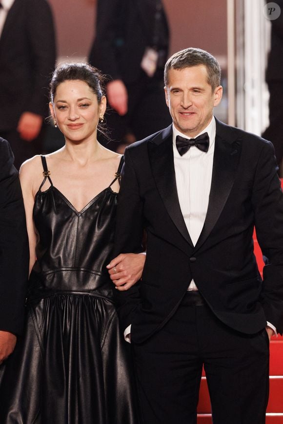 Marion Cotillard et Guillaume Canet - Descente des marches du film " Karma " lors du 79ème Festival International du Film de Cannes, le 15 mai 2026. © Jacovides-Moreau / Bestimage
|M - Descente des marches du film " Karma " lors du 79ème Festival International du Film de Cannes