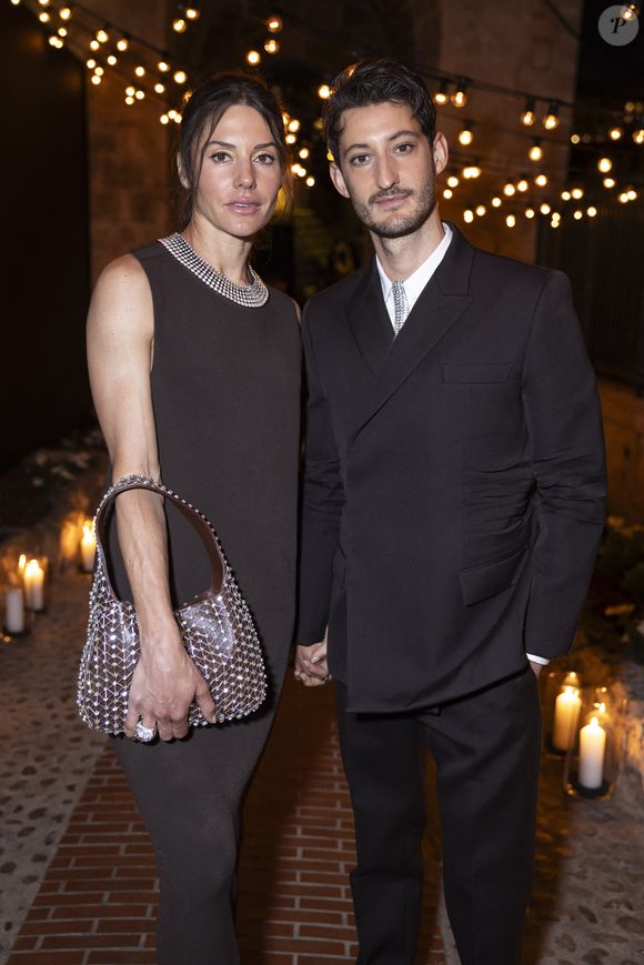Natasha Andrews et son compagnon Pierre Niney - Personnalités au dîner "Women in Motion" par le groupe Kering, Place de la Castre, lors du 77ème Festival International du Film de Cannes. © Olivier Borde / Bestimage