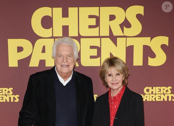 Elle incarne Jeanne, une retraitée qui, après un gain à la loterie, part au Cambodge avec son mari pour ouvrir un orphelinat, laissant ses enfants sans héritage.

André Dussollier et Miou Miou - Avant-première du film "chers parents" au cinéma UGC Ciné Cité Bercy le 16 février 2026.

© Coadic Guirec / Bestimage