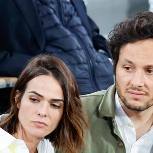 Florent Pagny a notamment raconté que c’est elle qui avait poussé Vianney à lui proposer la chanson "T’aimer encore".

Le chanteur Vianney et sa femme Catherine Robert en tribunes lors des Internationaux de France de Tennis de Roland Garros 2025, à Paris, France, le 6 juin 2025. © Jacovides-Moreau/Bestimage