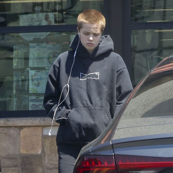 Los Feliz, CA  - EXCLUSIVE  - Shiloh Jolie-Pitt, Angelina Jolie and Brad Pitt's child, was photographed running errands. Shiloh wears black clothing, short hair, headphones, Nike sneakers, and carries a bag.



Pictured: Shiloh Jolie Pitt