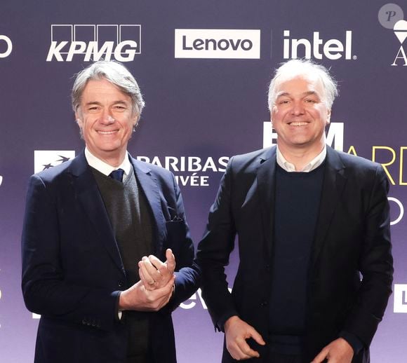 Si Alain Marshall et Olivier Truchot ont annoncé rempiler sur RMC pour la prochaine saison, voilà qu'un ancien chroniqueur emblématique va quitter "Les Grandes Gueules".

Alain Marshall, Olivier Truchot, au photocall de la cérémonie des BFM awards au Grand Palais à Paris.

© Jack Tribeca / Bestimage