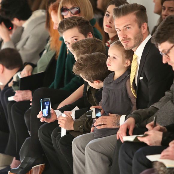David Beckham et ses enfants Brooklyn, Romeo, Cruz et Harper assistent au défilé de Victoria Beckham, collection prêt-à-porter automne 2014 à New York, le 9 février 2014. Anna Wintour était également présente.

Agence / Bestimage
