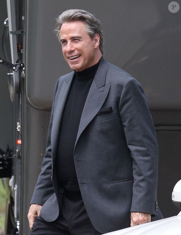 Exclusif - John Travolta et sa femme Kelly Preston sur le tournage de "Gotti: In the Shadow of my Father" à Cincinnati, le 27 juillet 2016.
Crédit : FAMEFLYNET / BESTIMAGE
