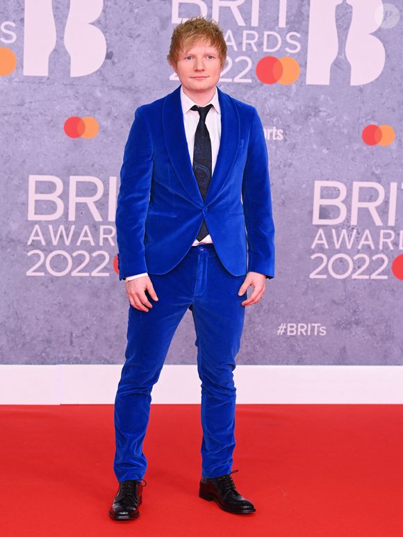 Depuis le début de sa carrière il y a vingt ans, Ed Sheeran a perdu de nombreux kilos.

Ed Sheeran au photocall de la soirée des BRIT Awards 2022 à l'O2, Peninsula Square de Londres, Royaume Uni, le 8 février 2022. 

Photo : Agence / Bestimage