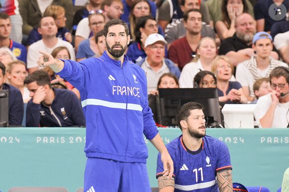 L'arrière gauche français Nikola Karabatic (13) et le joueur de ligne français Nicolas Tournat (11) lors du match de quart de finale masculin entre l'équipe d'Allemagne et l'équipe de France lors de la douzième journée des Jeux Olympiques d'été de Paris 2024 au Stade Pierre Mauroy le 07 août 2024 à Lille, France. 

Photo par Laurent Zabulon/ABACAPRESS.COM