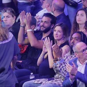 Maxim Nucci (Yodelice)  et sa compagne enceinte Isabelle Ithurburu - Maxim Nucci (Yodelice)  et sa compagne enceinte Isabelle Ithurburu assistent au match de boxe de Tony Yoka au palais des sports de Paris, le 23 juin 2018 © Veeren-CVS/Bestimage