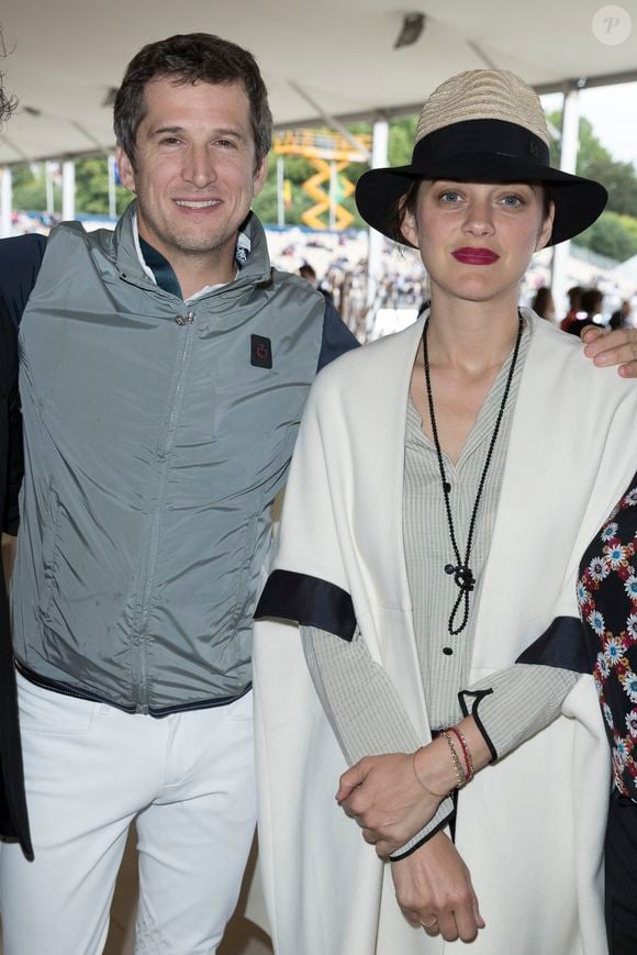 Exclusif - Guillaume Canet et Marion Cotillard - Soirée au profit de l'Association "La Bonne étoile" de Laeticia Hallyday lors du 3ème Longines Paris Eiffel Jumping à la plaine de Jeux de Bagatelle à Paris le 1er juillet 2016 dans le Pavillon Eiffel du Longines Paris Eiffel Jumping décoré par Luxury Living. © Olivier Borde / Veeren / Bestimage