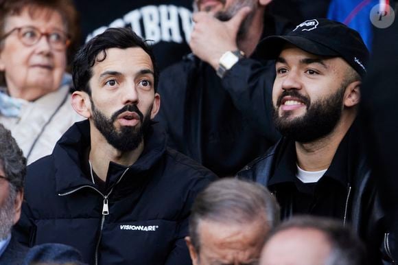 BigFlo et Oli - Célébrités dans les tribunes de la demi-finale retour de Ligue des champions entre le PSG face au Borussia Dortmund (0-1) au Parc des Princes à Paris le 7 mai 2024. © Cyril Moreau/Bestimage