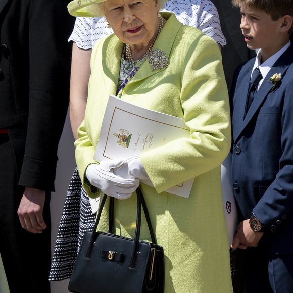 La reine Elisabeth II d’Angleterre - Les invités arrivent à la chapelle St. George pour le mariage du prince Harry et de Meghan Markle au château de Windsor, le 19 mai 2018.