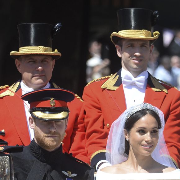 Si la jeune femme a la réputation d'avoir un caractère de cochon et capable des pires mesquineries selon certains employés de Buckingham Palace, elle aurait en tout cas décidé d'engager une nouvelle Directrice de la Communication selon le magazine "Hello !"

Le prince Harry, duc de Sussex, et Meghan Markle, duchesse de Sussex, en calèche à la sortie du château de Windsor après leur mariage le 19 mai 2018 Agence / Bestimage